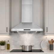 A wall mount stainless steel range hood