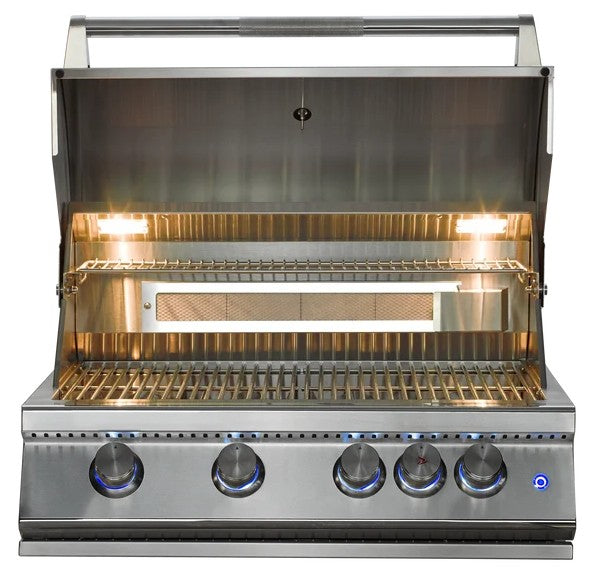 A stainless steel outdoor gas grill with its lid open, showing the interior grates, two built-in light bulbs, and five control knobs on the front with blue flame indicators.