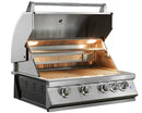 A stainless steel outdoor gas grill with its lid open, showing the lit interior grates and warming light. The grill has five control knobs on the front panel and is photographed against a plain white background.