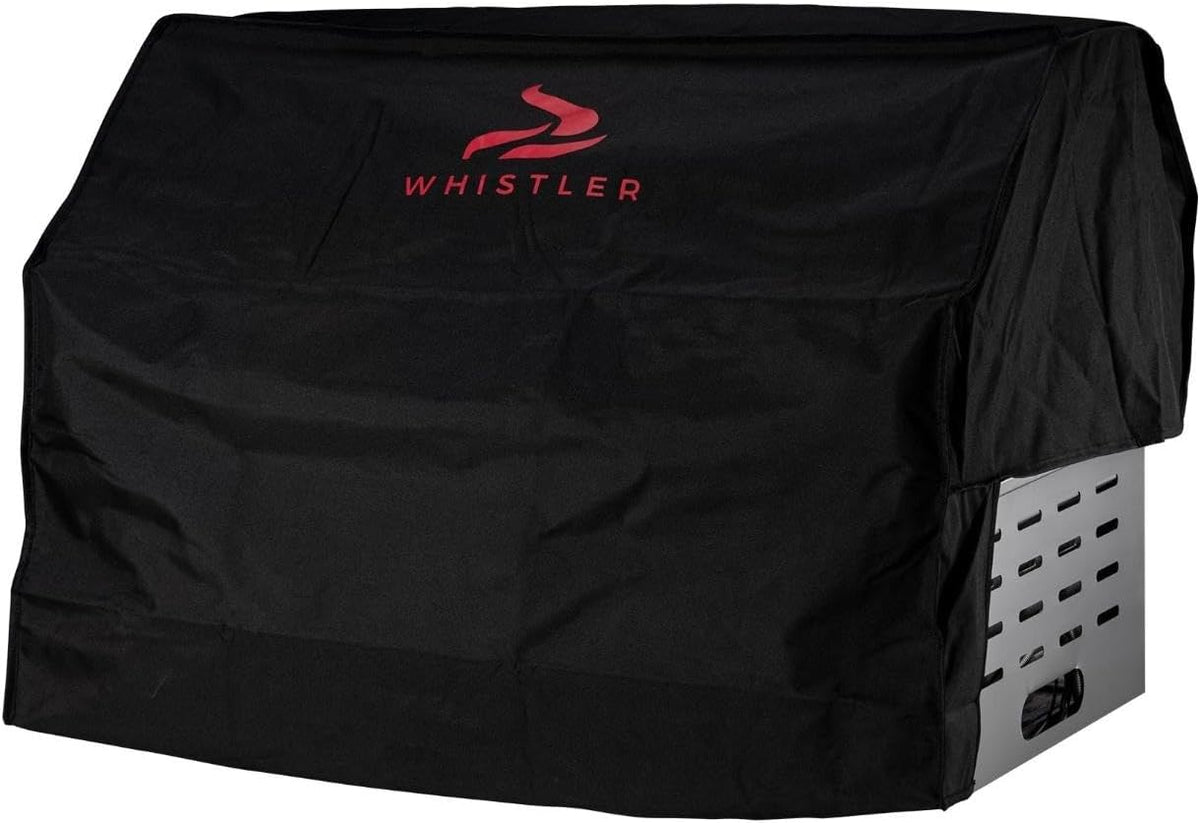 A black Whistler grill cover with a red logo and brand name printed on the top, shown fitted over a grill 
