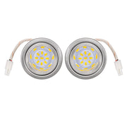 Two LED lights designed for range hoods with recessed light holes.
